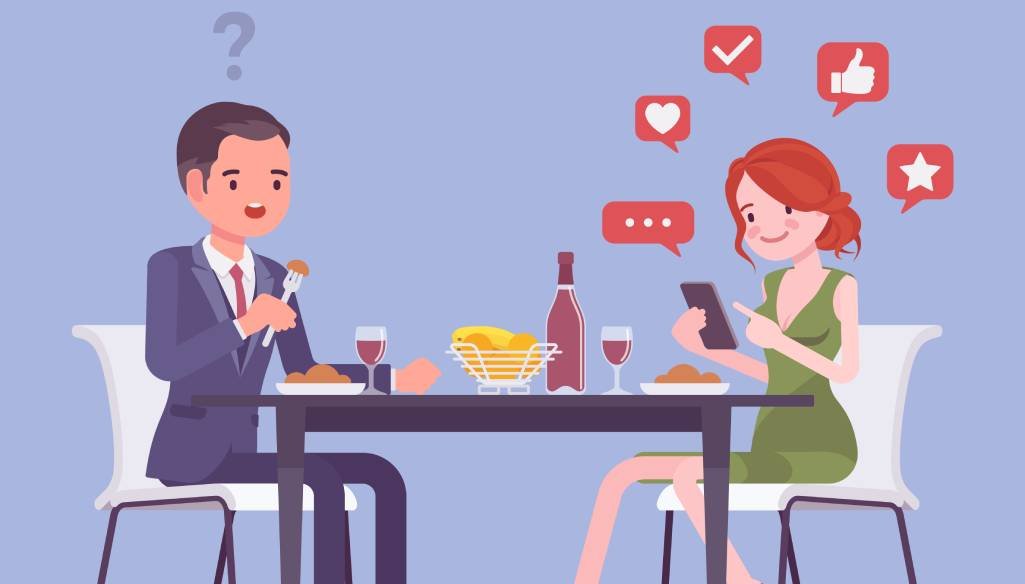 Social Media May Affect Relationships couple on dinner